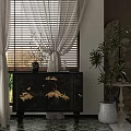 Black Chest of Drawers With White Cranes in Interior With Window Blinds Curtains and Green Plants