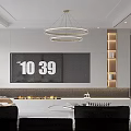 Modern Living And Dining Room Interior Design With Circular Chandelier Fireplace And TV Wall