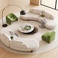 Curved Beige Sofa Set with Marble Coffee Table Green Armchairs Floor Lamp and Round Rug