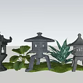 Traditional Japanese Garden Landscape With Illuminated Lanterns And Lush Green Plants