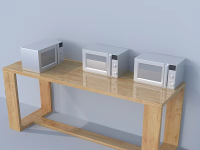 Three Stainless Steel Microwaves On Wooden Kitchen Table As Kitchen Appliances 3d model