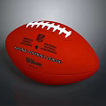 Red American Football With White Laces NFL Logo And Wilson Brand