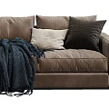 Comfortable Three-Seater Sofa with Throw Pillows and Cozy Blanket in Light Beige and Dark Brown