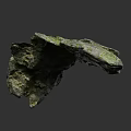 Natural Rock Formation With Rough Surface And Green Moss In Outdoor Environment