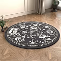 Round Rug with Black and White Floral Pattern on Wooden Floor