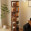 Cozy Rotating Wooden Bookshelf Interior With Green Plant Sofa And Throw Pillow