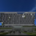 Modern Office Building With Glass Facade Grand Entrance And Pedestrians In Landscaped Area