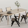 Modern Wooden Dining Table Set with Rattan Back Chairs Vase Greenery and Decorative Plate