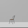 Minimalist Leisure Chair With Black Metal Frame Wooden Seat In Gray Wall Corner With Shadows