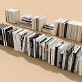 Stacked Books Collection With Various Sizes And Black White Spines On