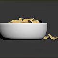 Golden Crunchy Potato Chips In White Bowl With Scattered Pieces On Dark Surface