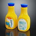 Tropicana 100 Pure Orange Juice In Two Yellow Bottles With Blue Caps