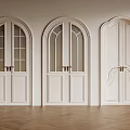 White Double Doors With Arched Rectangular Designs Glass Panes And Brass Handles On Wooden Flooring