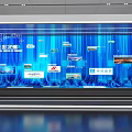 Large Digital Display Wall With Blue Background Showing Company Logos And Images With Person Standing