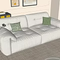 White Two Seater Sofa With Green Throw Pillows And Wall Art In Modern Living Room