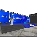 Modern Event Stage Design With Blue Lighting Large Screens And Audience Seats