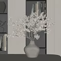 Modern Minimalist Floral Art Display With Vase And Foliage Branches On Bookshelf