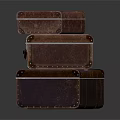 Vintage Leather Suitcases Stacked With Metal Hardware And Brown Exterior