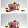 Fresh Ripe Strawberries in Glass Bowl with Sliced Strawberry and Green Leaf on White Background