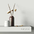 Brown Vase With Cotton Branches And White Jar On Minimalist Tabletop Decor