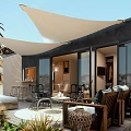 Modern Single Family House Featuring Wooden Exterior Outdoor Patio Furniture and Trees