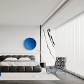 Modern Bedroom Interior Design With White Walls Blue Circular Artwork Black Bed And Accent Chair