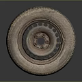 Old Worn Car Tire With Rusty Metal Rim On Dark Reflective Background
