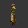 Elderly Woman in Green Coat With Yellow Scarf Standing on Grass Path With Flowers