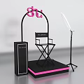 Pink Shu Themed Photo Check-in Spot Featuring Ring Light Director Chair And Black Platform