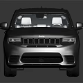 Silver Jeep SUV With Sporty Design Black Wheels Red Brake Calipers And Roof Rack