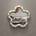 Decorative Flower Shaped Mirror With White Gold Spherical Decorative Frame Reflects Bedroom Interior
