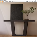 Modern Black Console Table with Patterned Decorative Panel and Green Plant in Minimalist Interior 3d model
