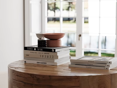 Decorative Ornament Set on Wooden Round Table with Stacked Books Black Ornament and Pink Bowl 3d model