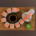 Snake Shaped Sushi Platter With Decorative Head Green Garnish On Wooden Tray And Soy Sauce