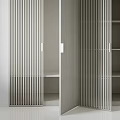 Sleek Modern Wardrobe With Vertical Slats Door And Internal Storage Shelves