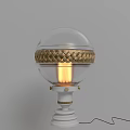 Illuminated Table Lamp With Transparent Spherical Shade Gold Braided Decoration And White Base
