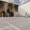 Electric Vehicle Charging Stations In Parking Lot With Red Brick Building And Green Vines