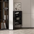 Stylish Modern Black Cabinet With Ribbed Glass Doors And Decorative Artwork Near Bookshelf
