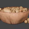 Fresh Potatoes in Earthenware Bowl with Another Empty Bowl and Two Beside
