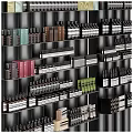Neatly Arranged Perfumes And Cosmetics Display On Multiple Shelves With Various Bottles And Different Colors