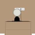 Beige Round Lampshade Table Lamp With Black Base On Wooden Nightstand