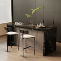 Modern Black Marble Bar Counter With White Cushioned Bar Stools And Green Plant