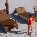 Outdoor Landscape Seats With Wooden Metal Structure For Adults And Children On Paved Ground