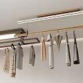 Ceiling Mounted Clothes Hanger Holding Different Patterned Dresses and Shirts in Modern Closet Setup 3d model