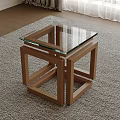 Sleek Modern Side Table With Glass Top And Black Geometric Metal Frame Design