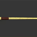 Elegant Golden Decorative Stick With Red Wrapped Handle And Polished Surface