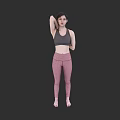 Woman In Gray Sports Bra And Pink Leggings Stretching On Black Background