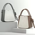 Two Stylish Bucket Bags With Contrast Colors And Knot Details