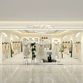 Stylish Clothing Store With White Interior Mannequins Hanging Clothes And Plants