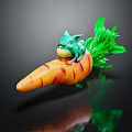 Small Green Game Character Sitting On Orange Carrot With Green Leaves
